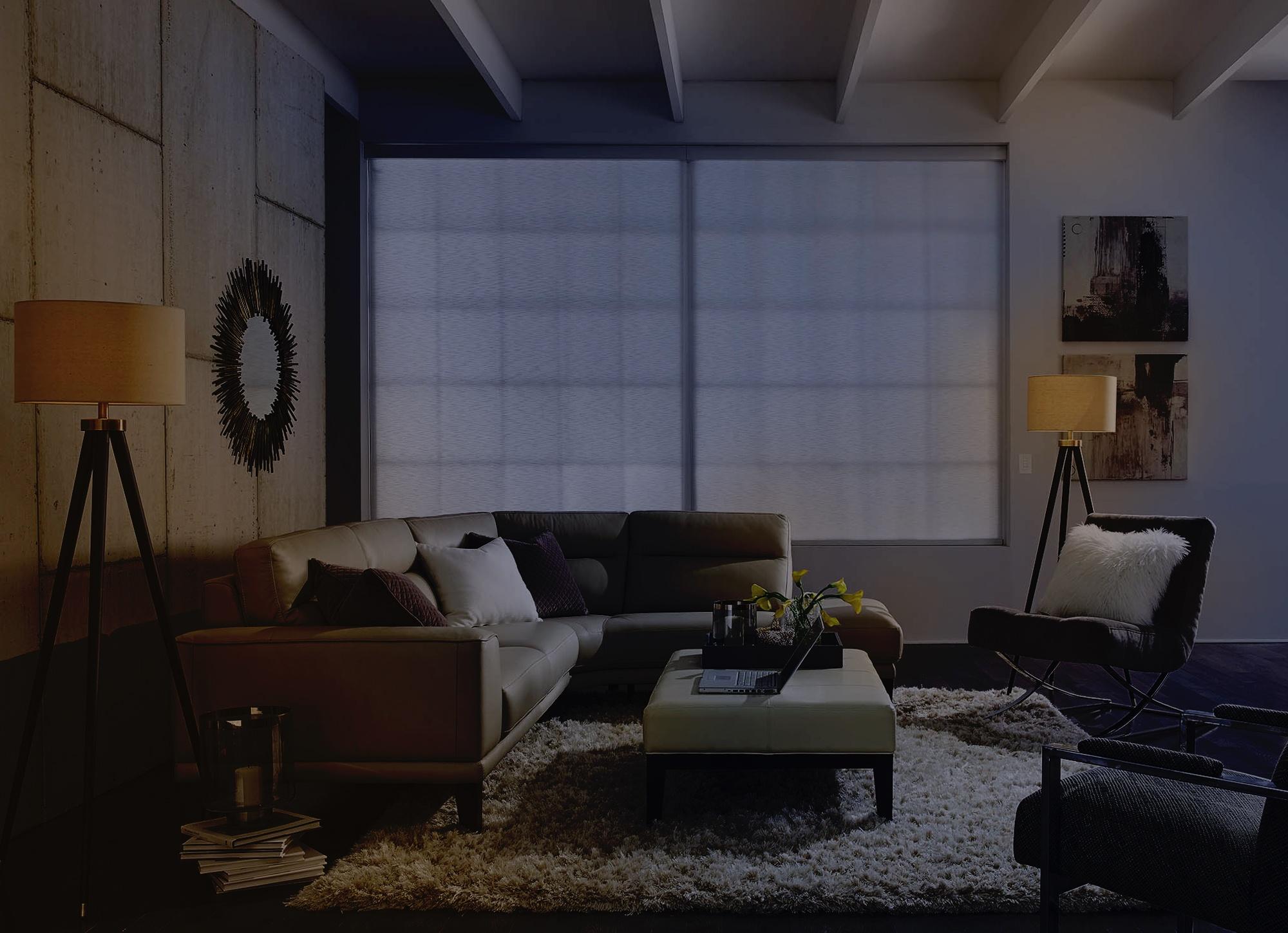 Bedroom with a warm Lutron bedtime scene